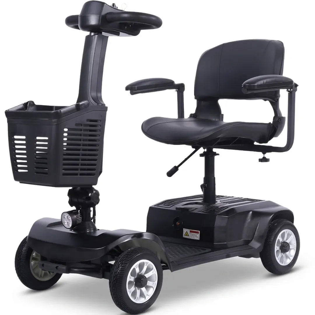 Scooter eléctrico de 4 ruedas gris de dimensiones compactas ideal para uso domiciliario, ascensores y maniobras reducida dortomedical