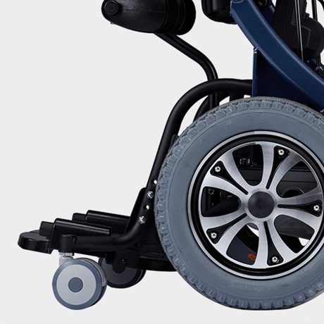 Silla de Ruedas Eléctrica de Bipedestación Ruedines Antivuelco