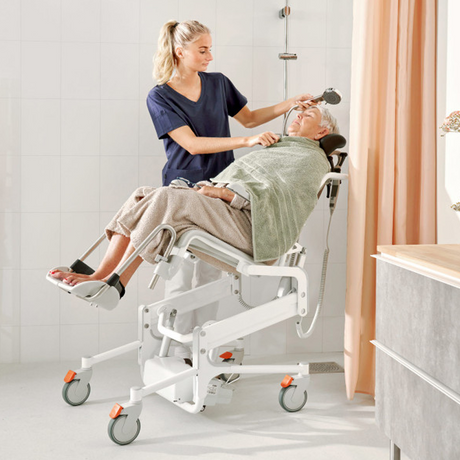 Silla para Ducha y Wc BASCULANTE Y ELEVABLE ELÉCTRICA