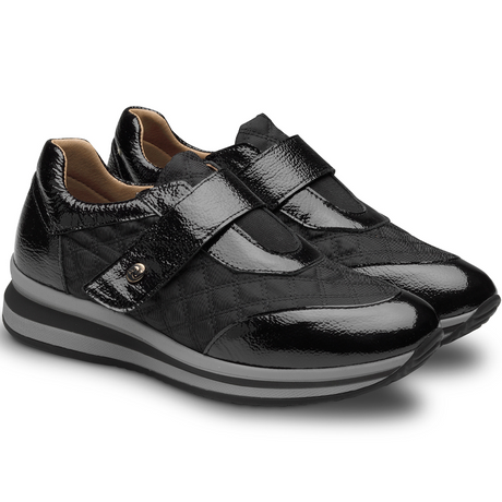 Sapatos ortopédicos femininos modernos da Saguy