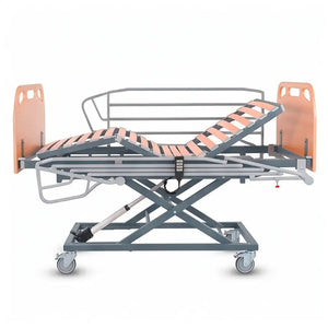 Vista lateral de la cama articulada eléctrica con esquinas redondeadas para un diseño amable dortomedical