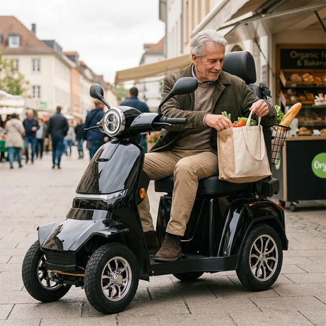Hombre usando scooter eléctrico para adultos apto para uso cotidiano por su gran maniobrabilidad dortomedical